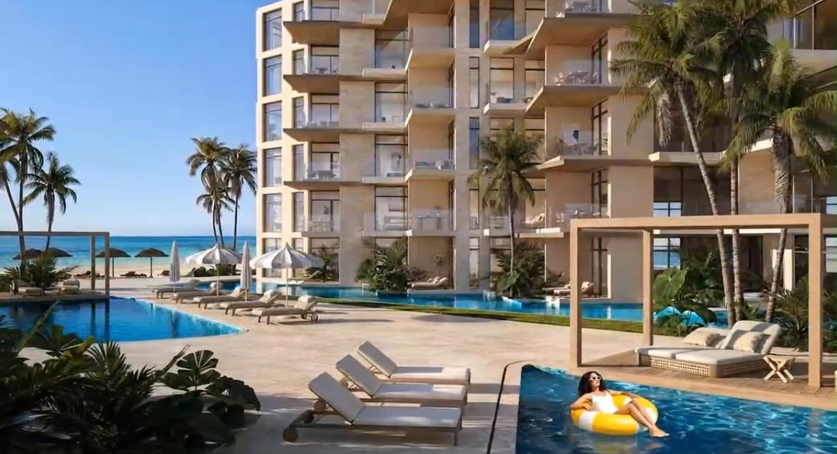 Sea Breeze Resort Hurghada exterior with landscaped swimming pool