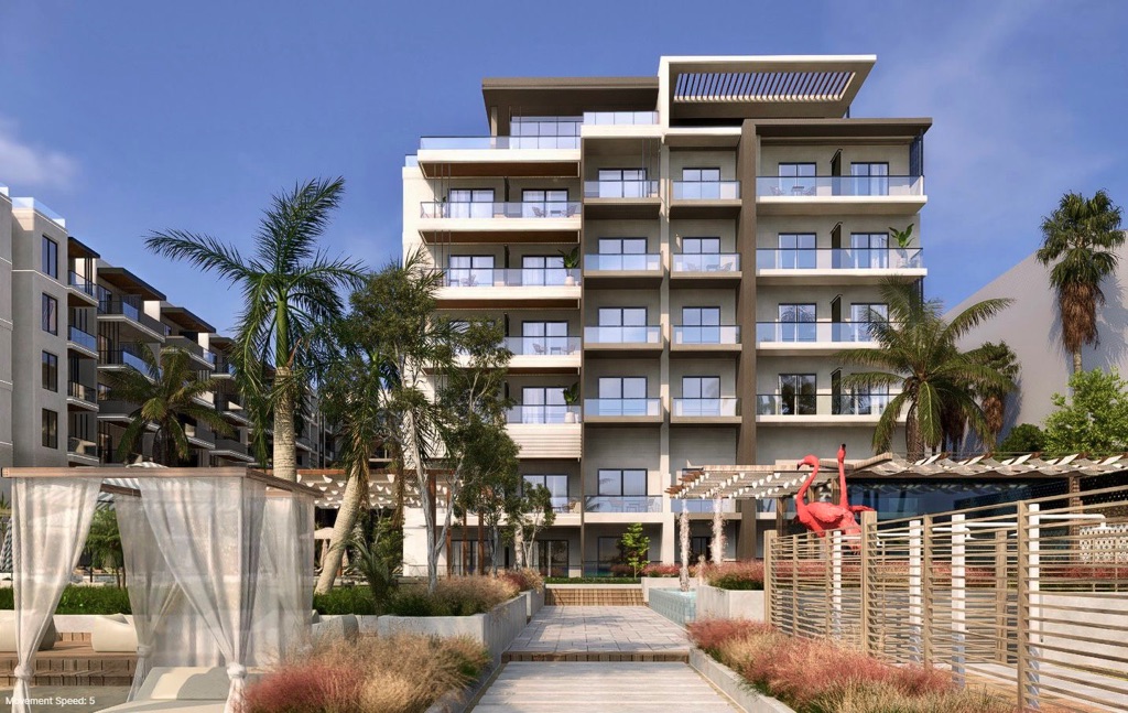 Oro Beach apartment balconies and landscaped grounds
