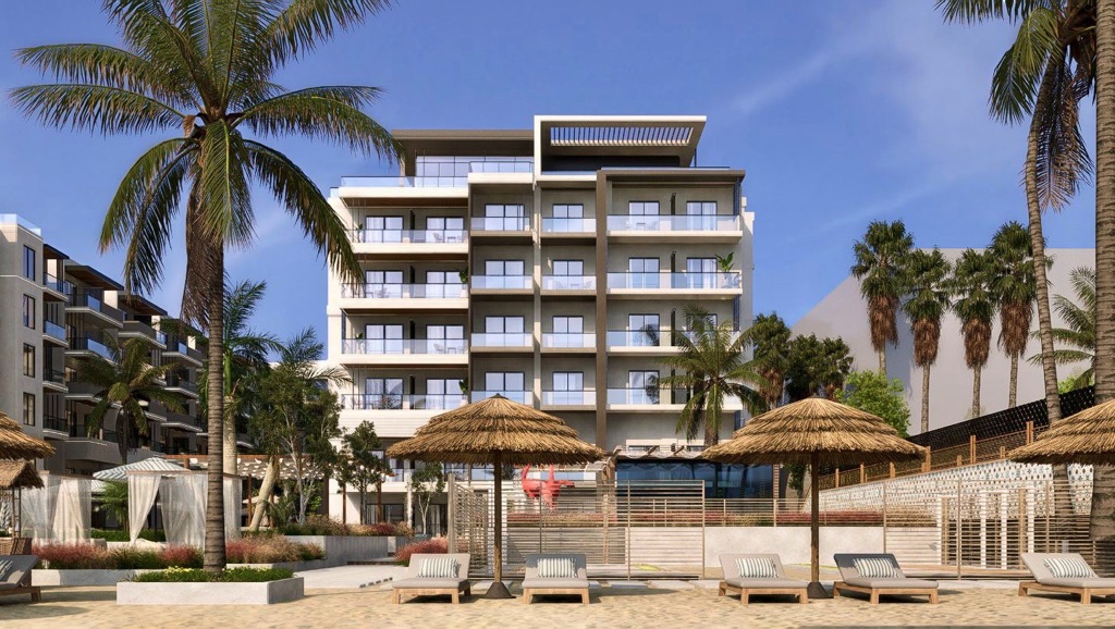 Oro Beach shaded walkway and resort landscaping