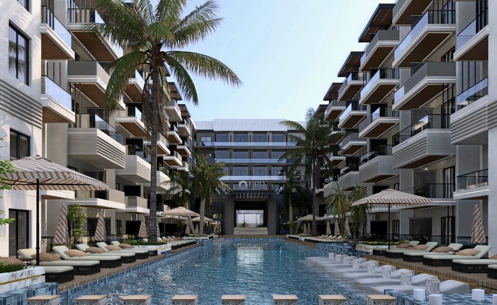 Oro Beach swimming pool between apartment buildings