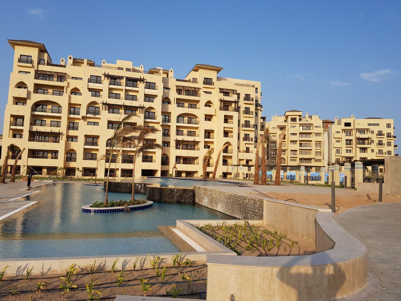 ALDAU Heights landscaped pedestrian area and buildings