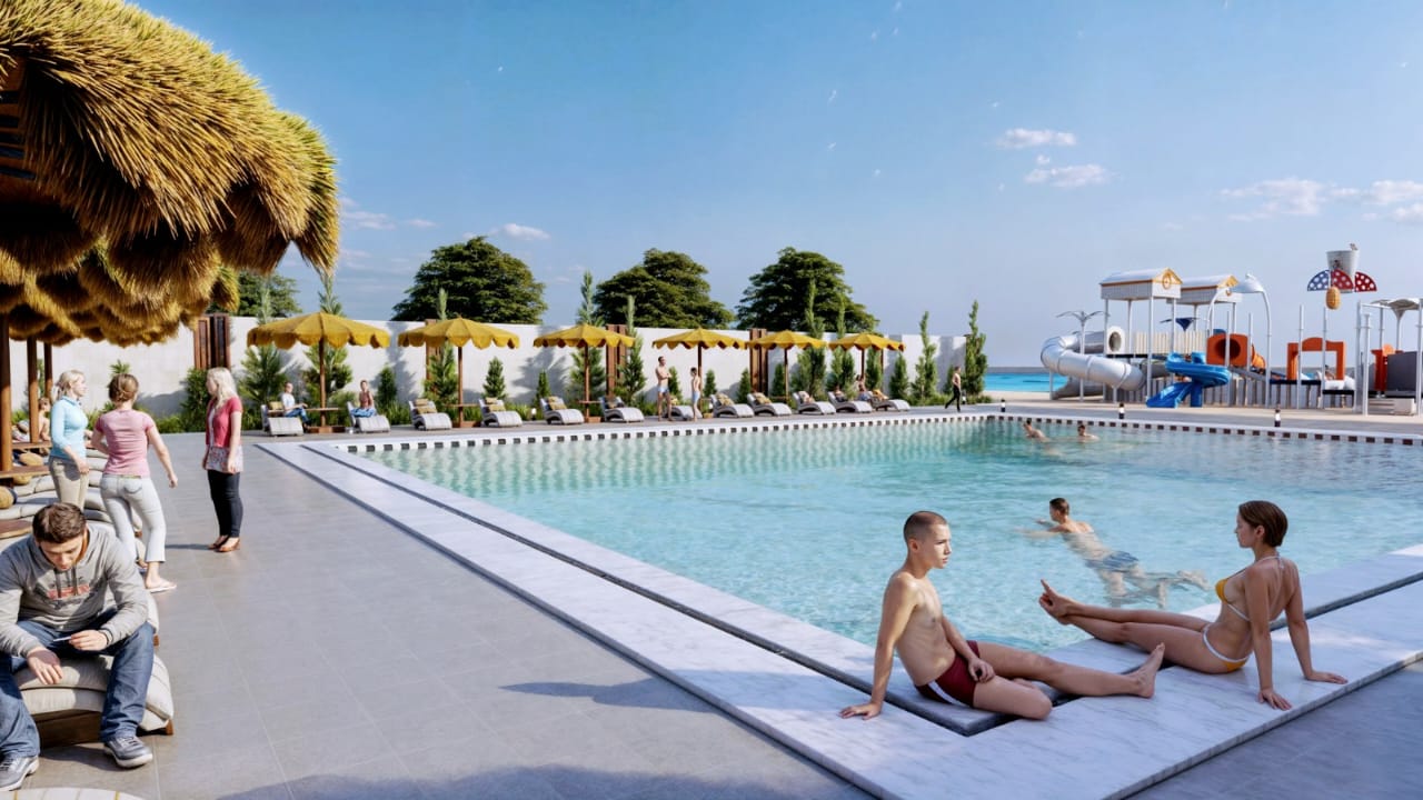 Swimming pool and beach setting at Premier Beach Hurghada