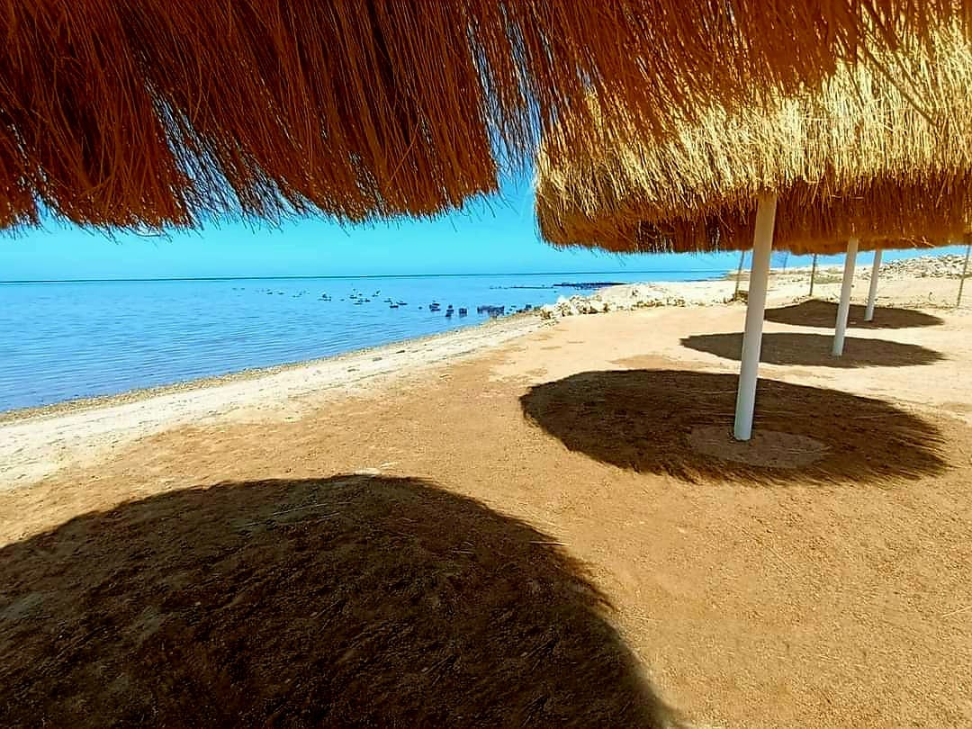 Shaded beach seating at Premier Beach resort Hurghada