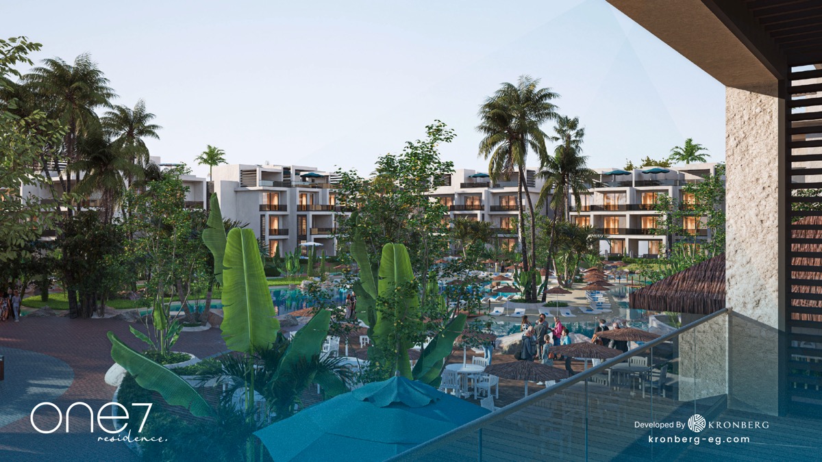 One7 Hurghada apartments – lagoon and landscaped courtyard seen from a terrace, developer rendering