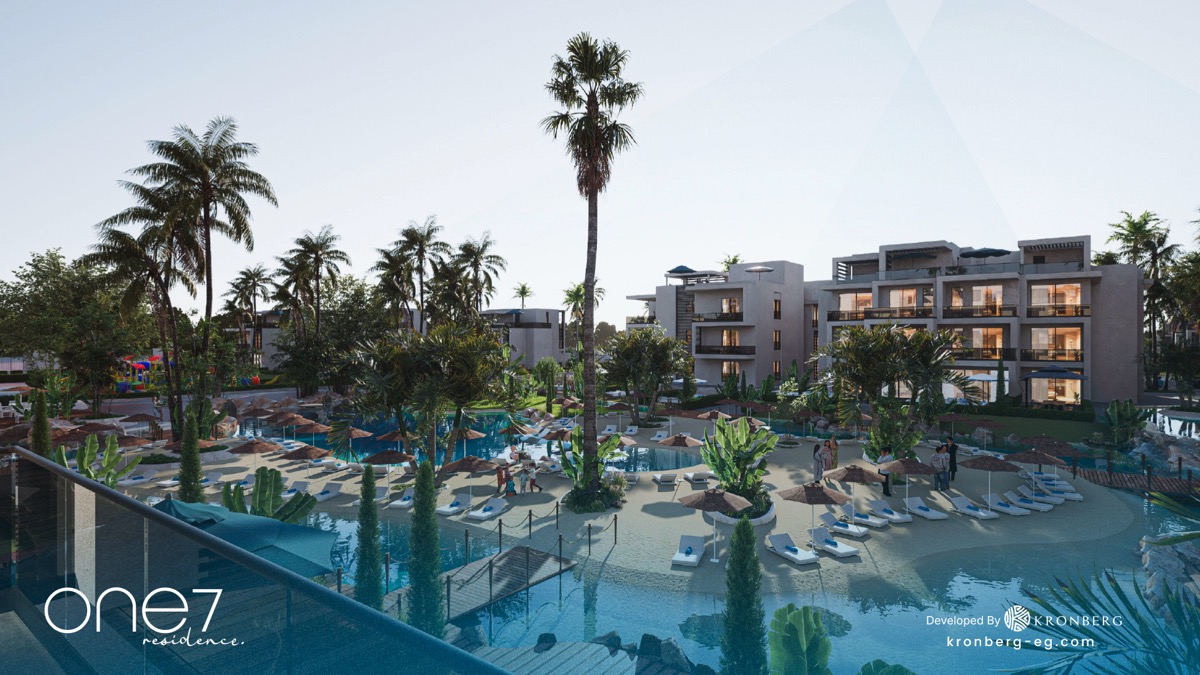 One7 apartments for sale – palm-lined lagoon and poolside seating, developer rendering