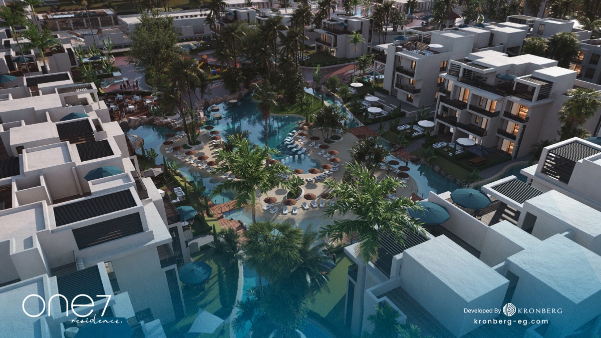 One7 Hurghada penthouse – aerial view of apartment rooftops and winding lagoon, developer rendering