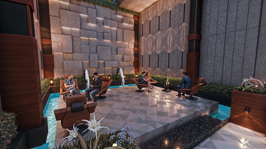 Iconic Resort Hurghada – sheltered terrace seating and stone wall, developer render