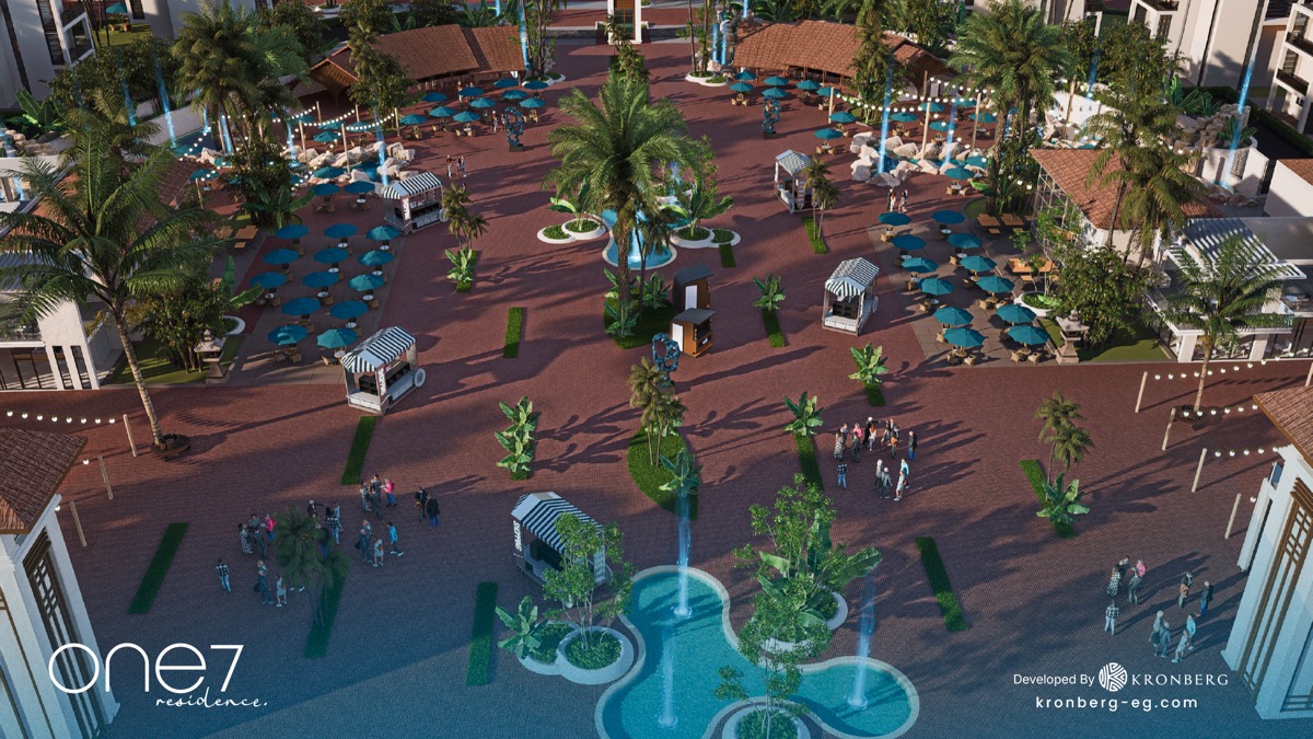 One7 Hurghada – central plaza with palms and decorative water features, developer rendering