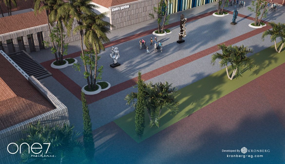 One7 apartments for sale – entrance road and palm-lined pedestrian route, developer rendering