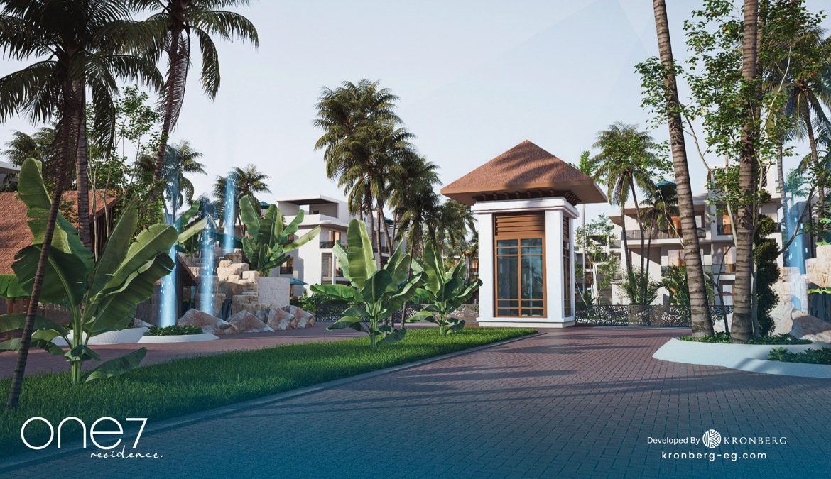 One7 Hurghada – gatehouse framed by tropical planting, developer rendering