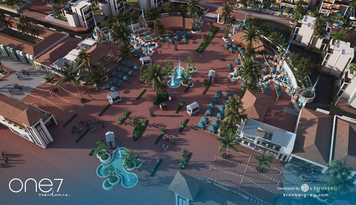 One7 Hurghada apartments – central plaza with planting and seating areas, developer rendering