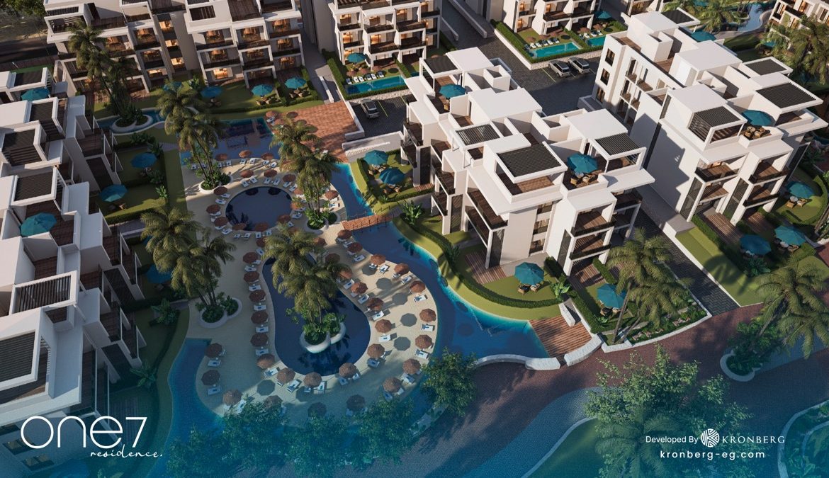 One7 Hurghada apartments – overhead view of apartment blocks and tropical lagoon, developer rendering