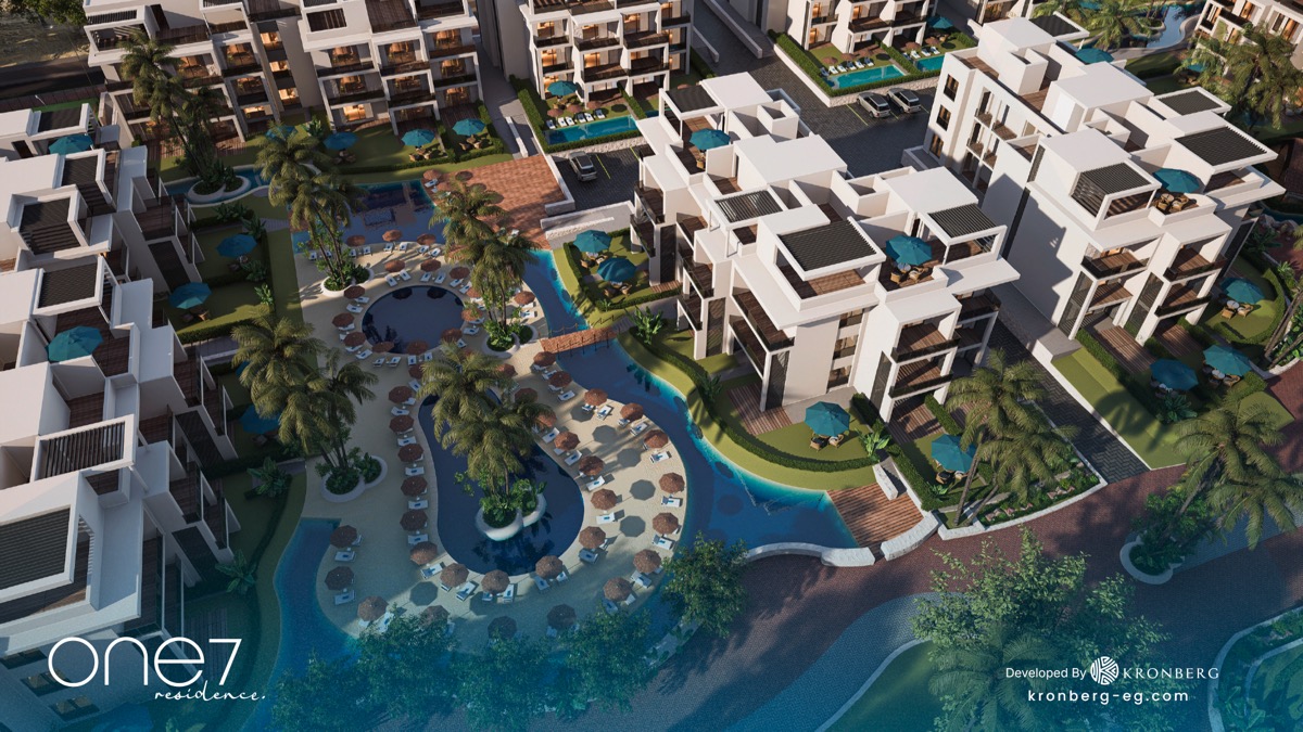 One7 Hurghada apartments – overhead view of apartment blocks and tropical lagoon, developer rendering